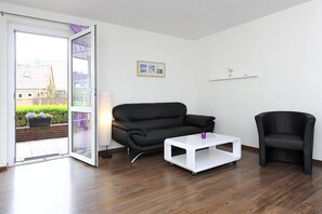 Apartment (Austernfischer) | Wohnzimmer | Flachbildfernseher