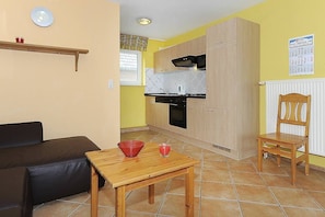 Family Apartment, 2 Bedrooms (Norderney) | Living room | Flat-screen TV - Reiterhof Maack (Neuharlingersiel)