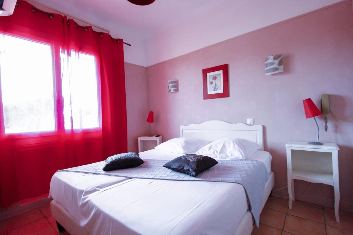 Blackout drapes, soundproofing, iron/ironing board