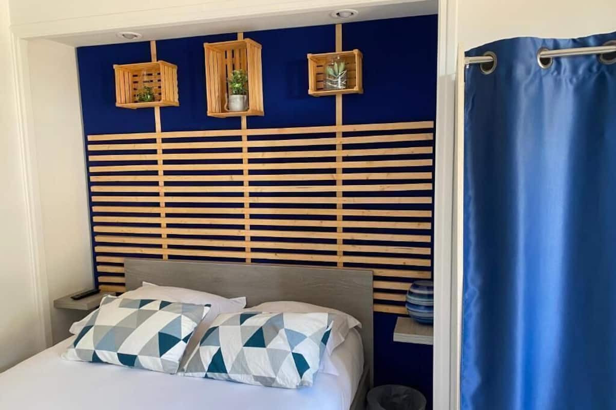 Blackout drapes, soundproofing, iron/ironing board