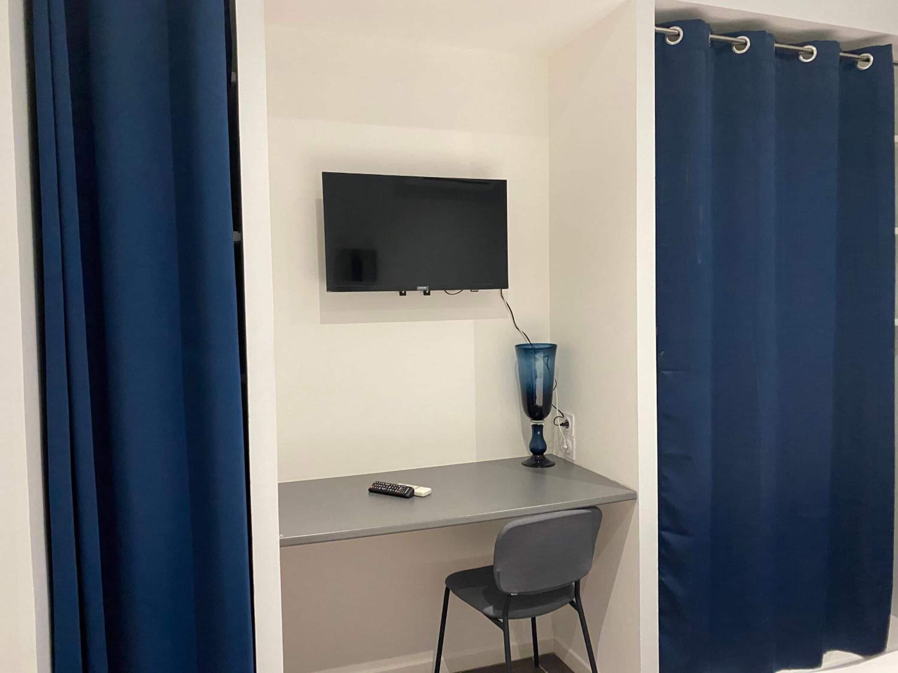 family room | 1 bedroom, blackout curtains, soundproofing, iron/ironing board