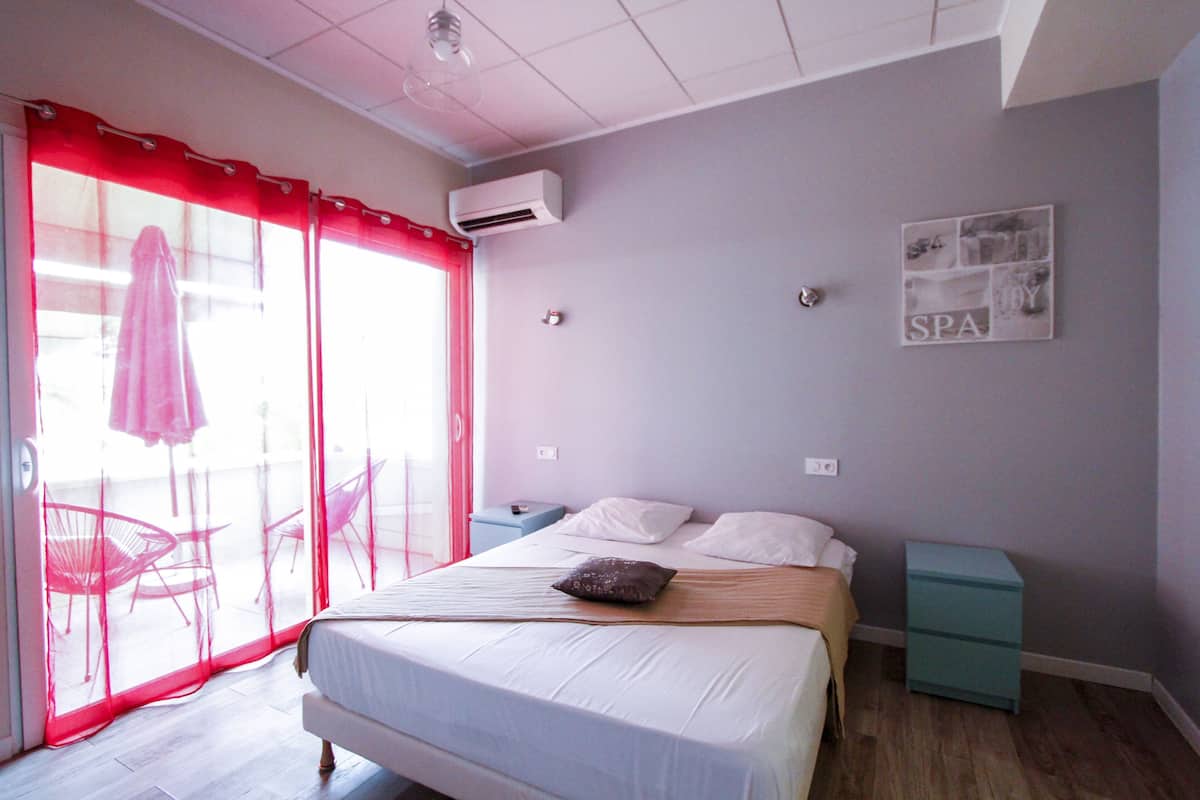 Blackout drapes, soundproofing, iron/ironing board