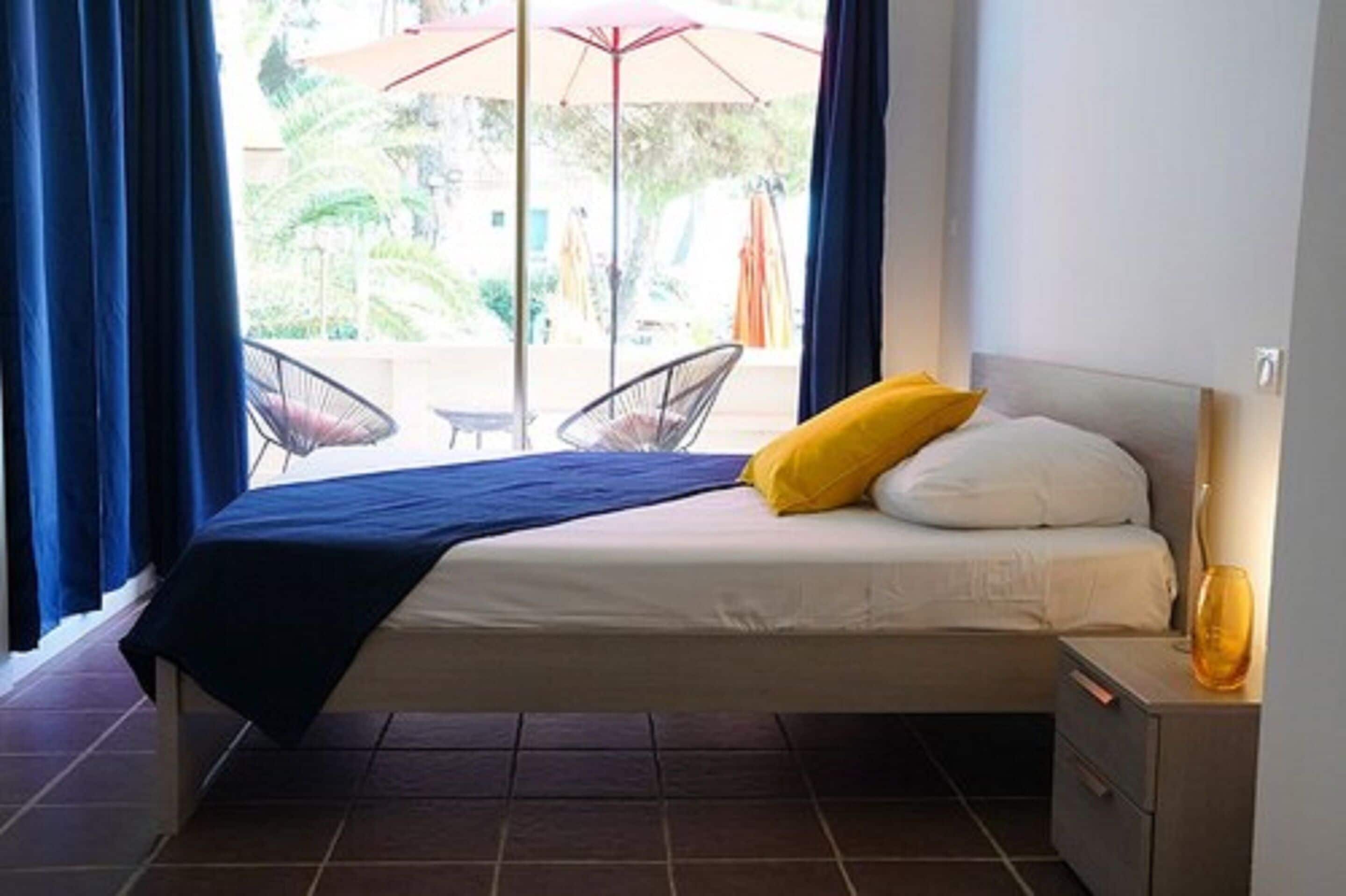 family room | 1 bedroom, blackout curtains, soundproofing, iron/ironing board