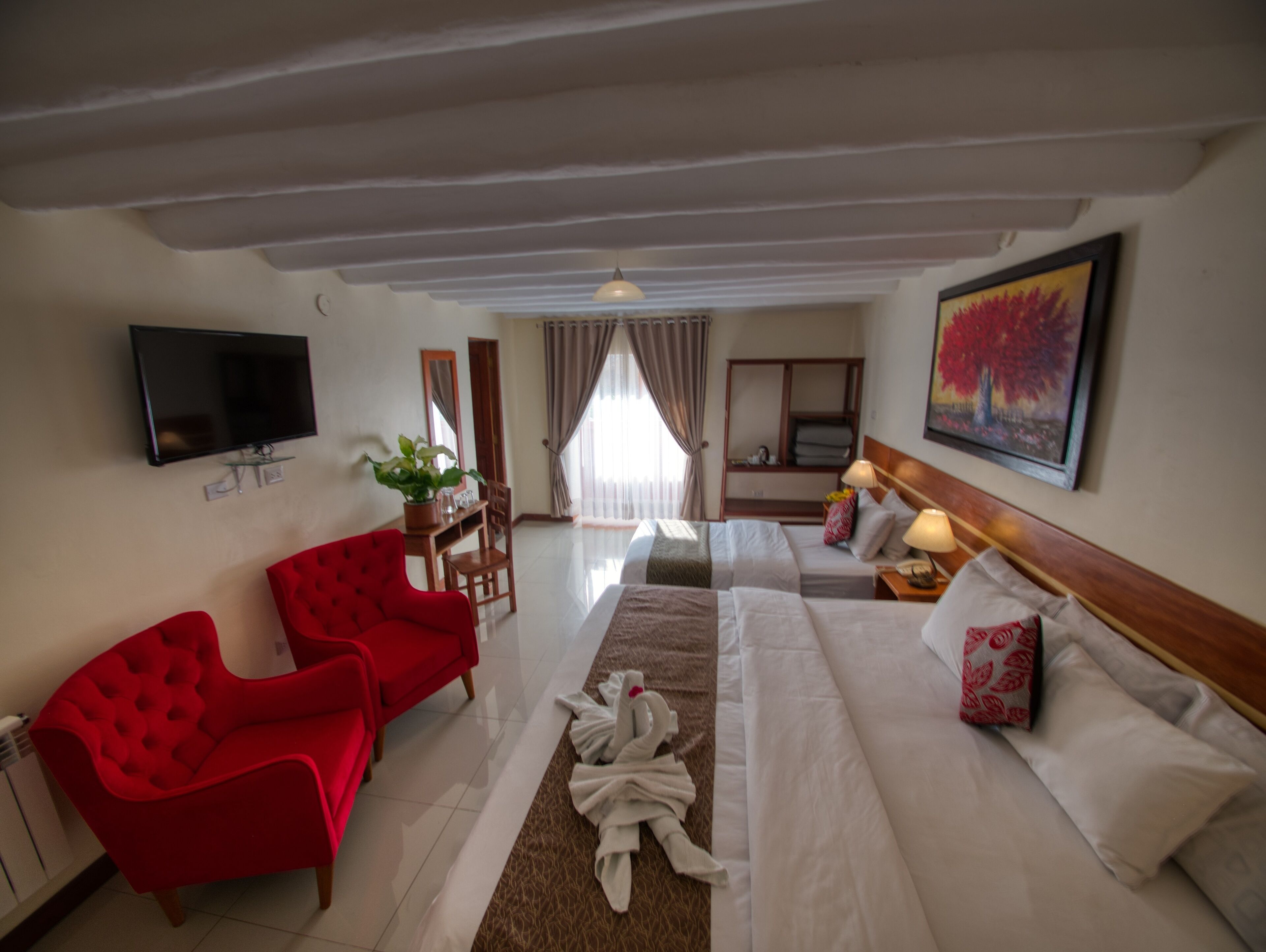 deluxe family room with balcony and views | 1 bedroom, desk, blackout curtains, free wifi