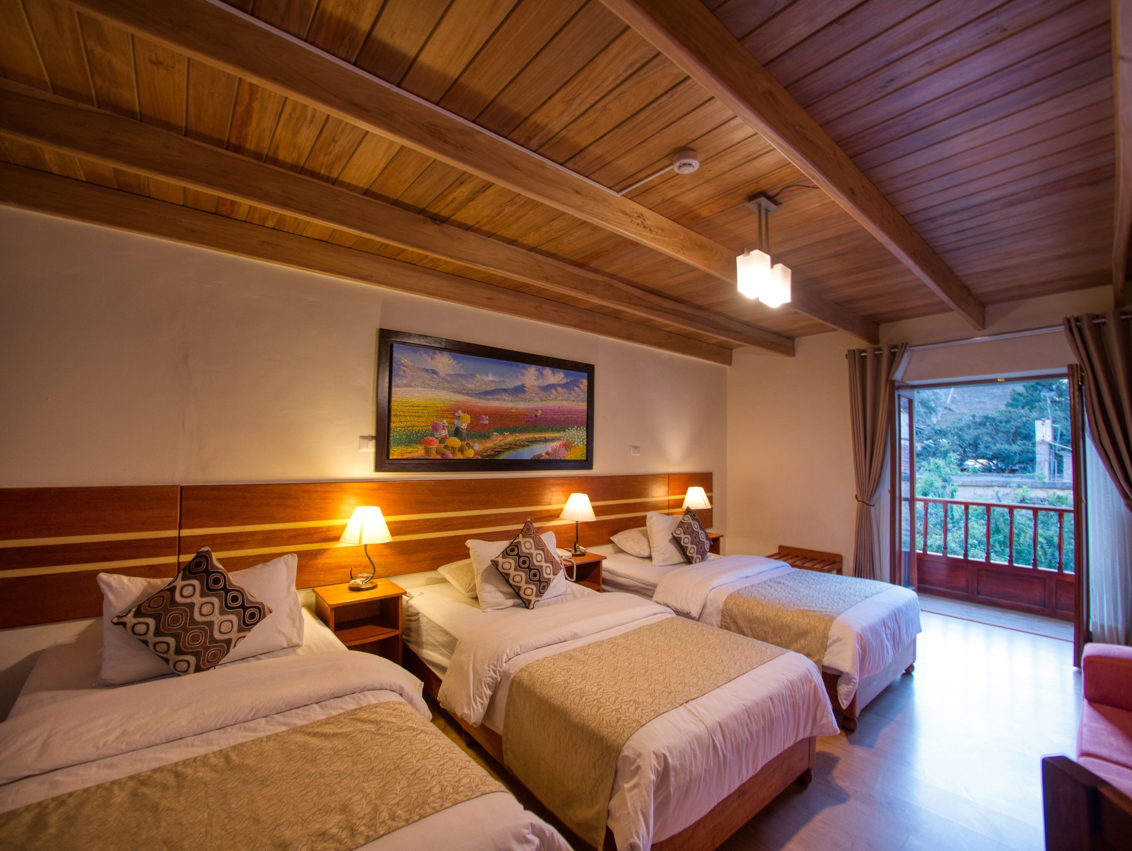 deluxe triple room with balcony and views | 1 bedroom, desk, blackout curtains, free wifi