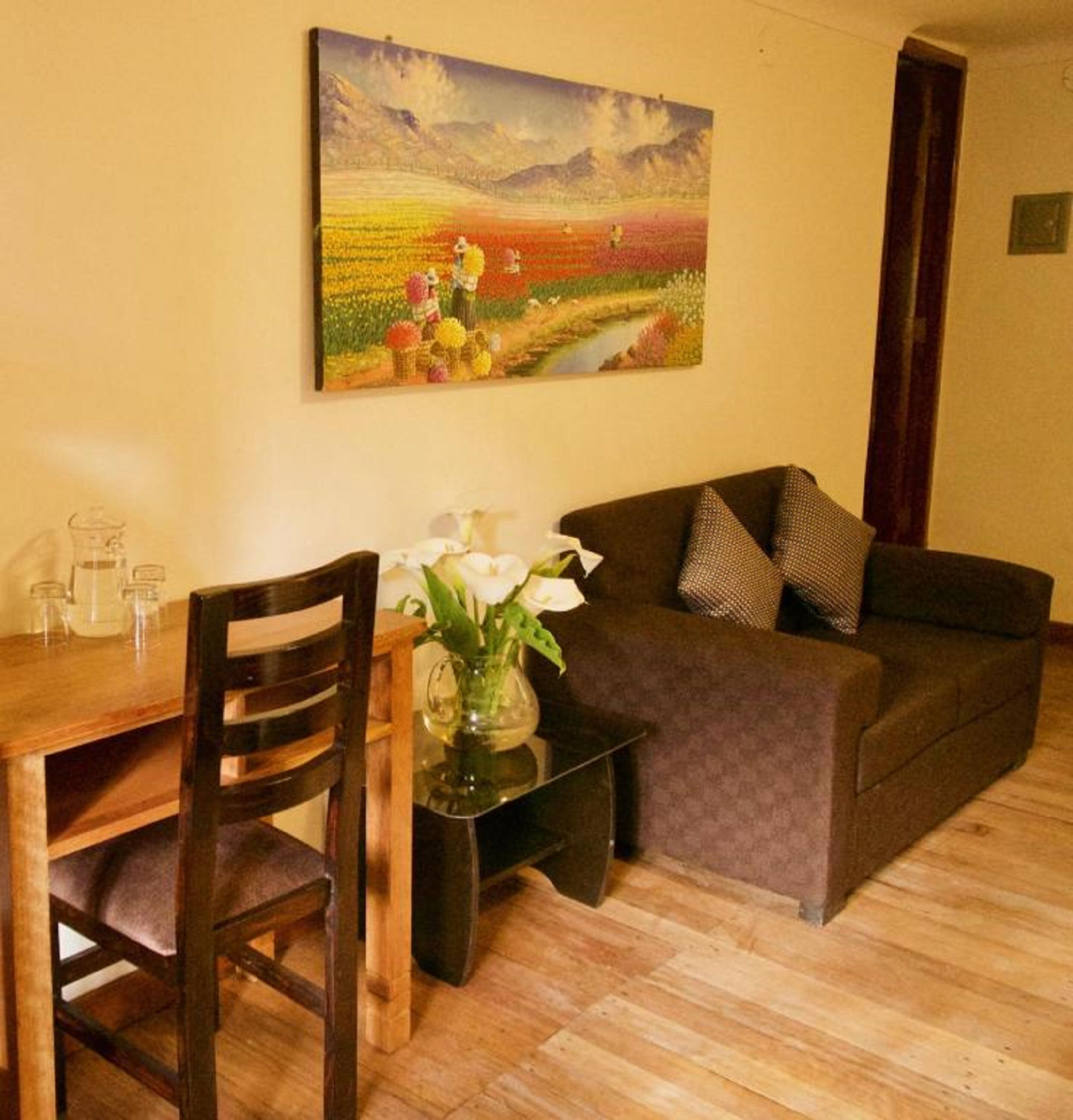 deluxe single room with balcony and views | living area | 40-cm flat-screen tv with satellite channels, tv