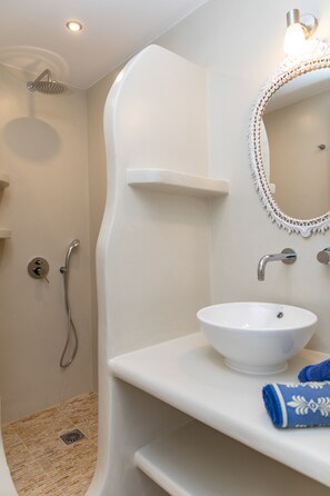 Combined shower/tub, hair dryer, towels, soap
