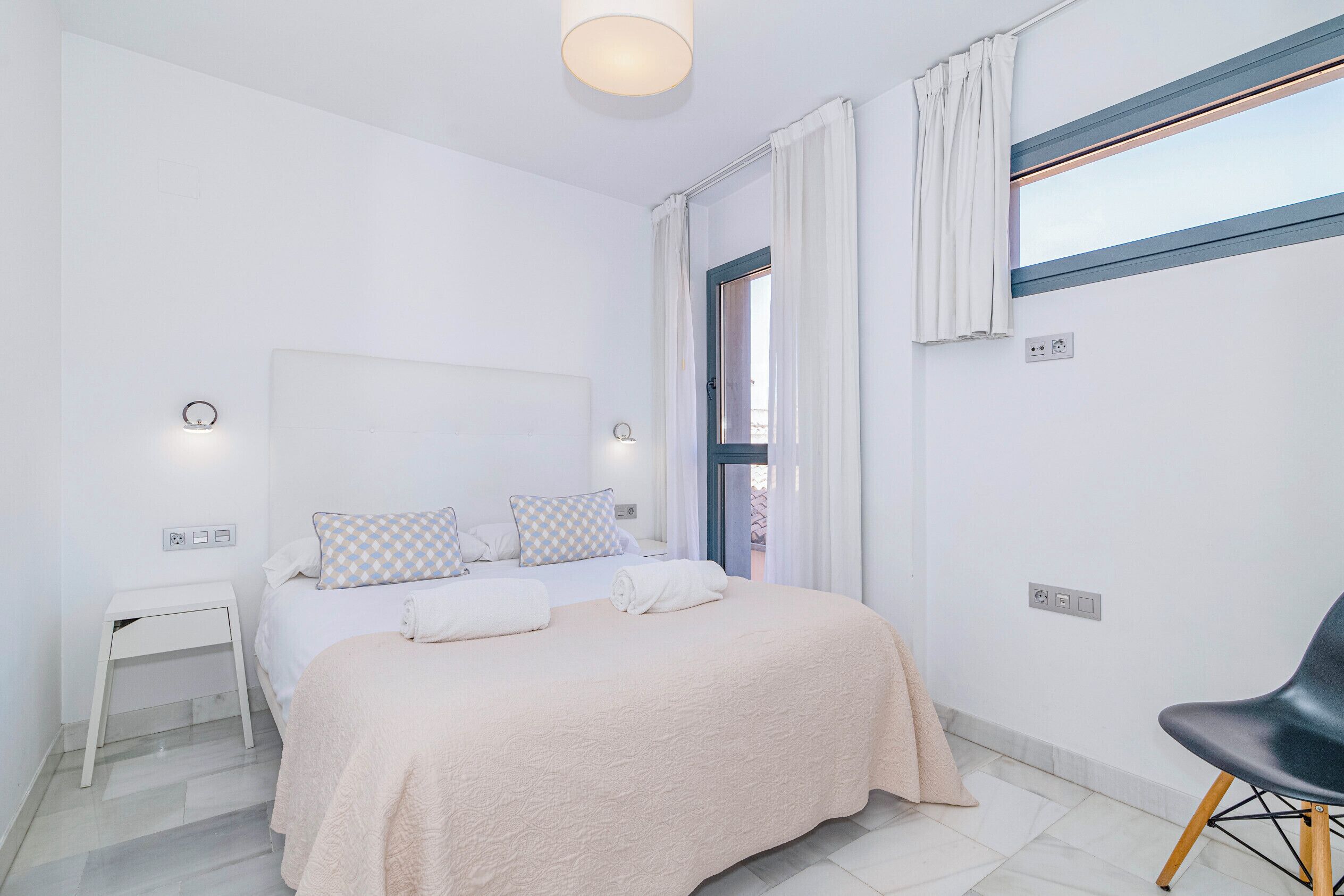 Down comforters, memory foam beds, laptop workspace, blackout drapes