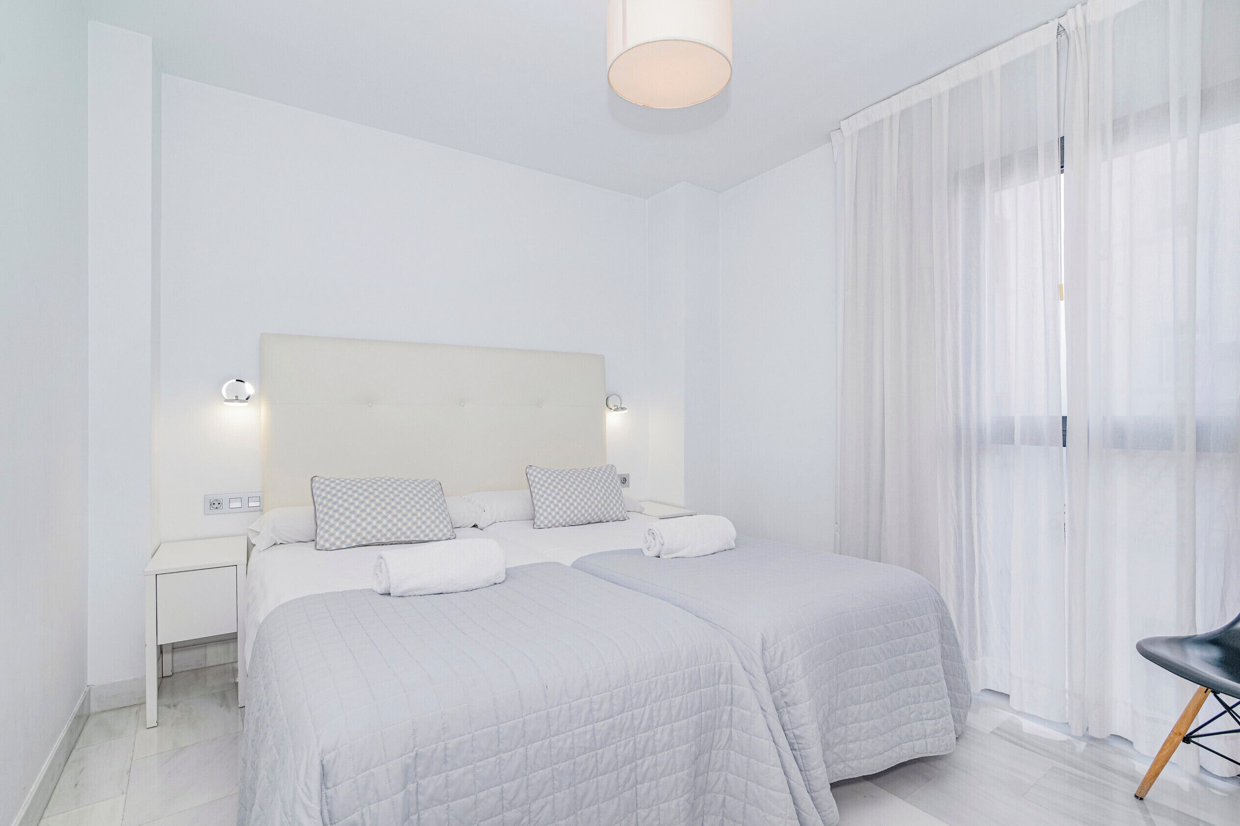 Down comforters, memory foam beds, laptop workspace, blackout drapes
