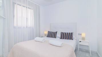 Down comforters, memory foam beds, laptop workspace, blackout drapes