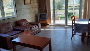 Comfort Cottage | Living area | TV