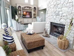 House, Multiple Beds, Balcony, Partial Ocean View | Living room | TV - Seas the Day - Upper (Palm Coast)