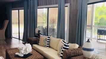 House, Multiple Beds, Balcony, Partial Ocean View | Living room | TV