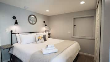 1 bedroom, desk, iron/ironing board, travel crib