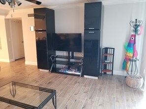 Condo, Multiple Beds, Balcony, Ocean View | Living room | TV