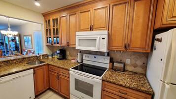 Condo, Multiple Beds, Balcony, Ocean View | Private kitchen | Fridge, microwave, oven, stovetop