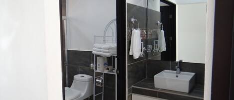 Shower, hair dryer, towels, soap