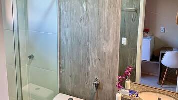 Shower, bidet, towels, soap