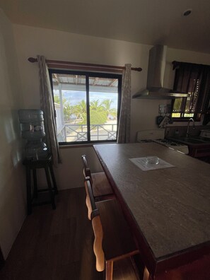 Coffee/tea maker, blender, cookware/dishes/utensils, spices - Hidden Treasure Vacation Home<br>Bayblue Cottage Breathtaking view beautiful sunset (Belize C.A)