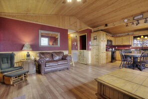 42-inch TV with cable channels, fireplace