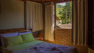 Suíte (Tulipas) | 1 quarto, frigobar, cortinas blackout, ferros/tábuas de passar roupa