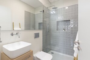 Shower, hair dryer, soap, shampoo