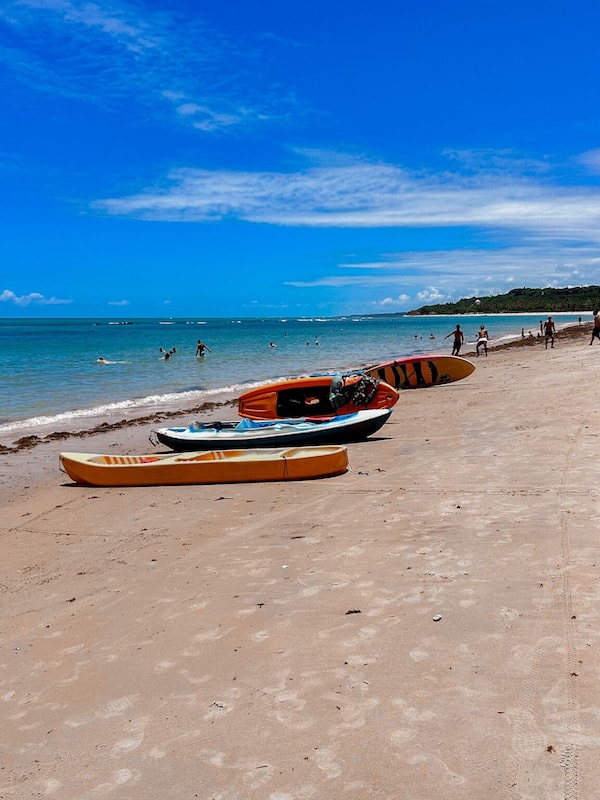 On the beach, white sand, free beach cabanas, sun-loungers