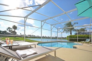 A heated pool, pool loungers