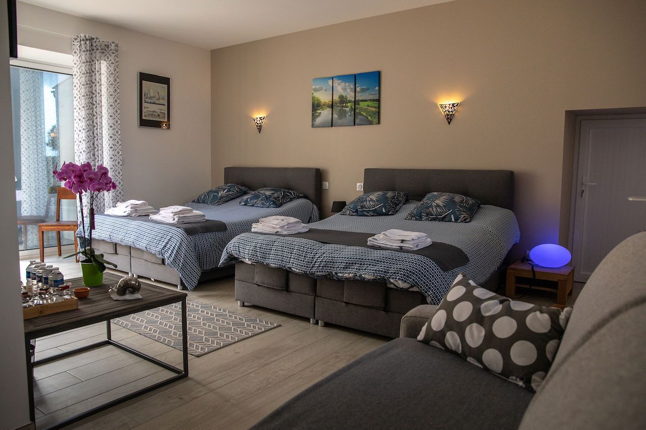 Premium bedding, pillow-top beds, laptop workspace, soundproofing