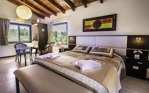 Comfort Studio Suite, Private Bathroom | Premium bedding, down duvets, pillow-top beds, minibar - Aires Serranos - Suites (La Cumbrecita)