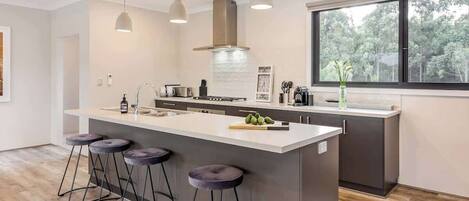 Coffee/tea maker, fridge, microwave, oven