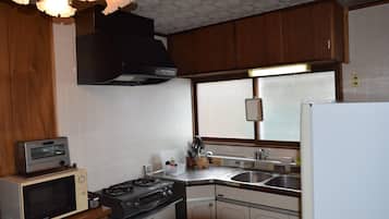 Fridge, microwave, stovetop, cookware/dishes/utensils