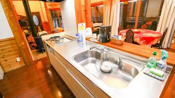 Fridge, microwave, stovetop, cookware/dishes/utensils