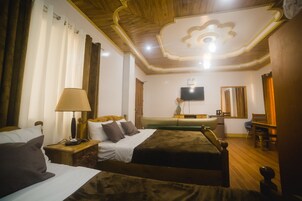 Family Suite, Balcony | Living area | Flat-screen TV