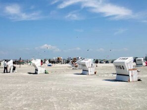 A large open area with several white structures labeled with numbers, likely for an event or gathering.