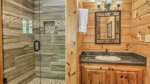 Combined shower/tub, jetted tub, hair dryer, towels
