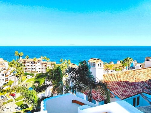 RECENTLY REMODELED OCEAN VIEW CONDO w/golfcart