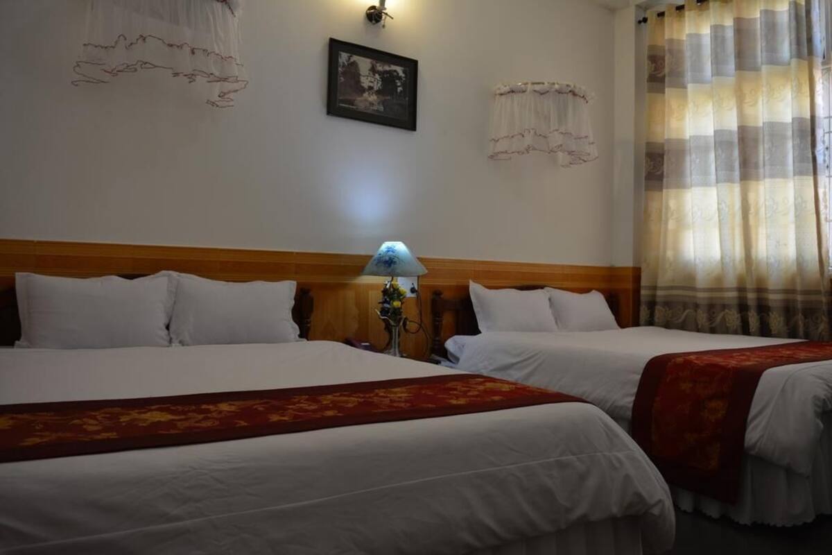 Standard Quadruple Room | Peralatan tempat tidur premium, tilam berlapik, bar mini, meja 