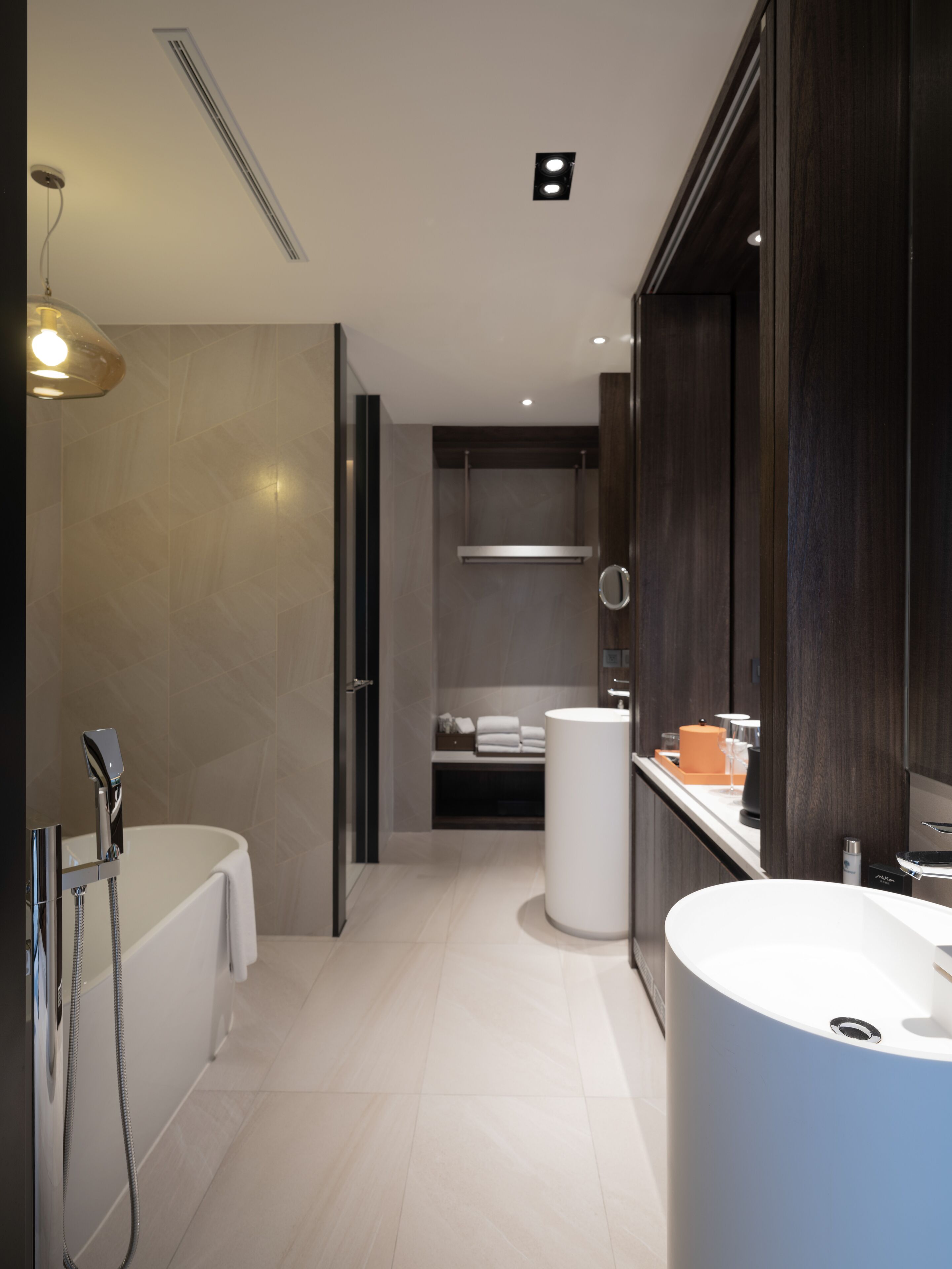 sky villa | bathroom | hair dryer, bathrobes, slippers, electronic bidet