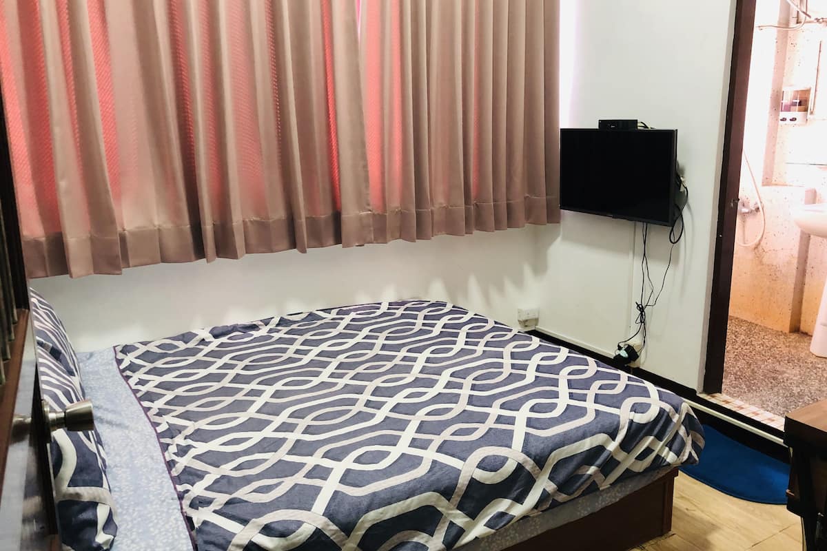 Habitación doble estándar | Escritorio, cortinas blackout, wifi gratis y ropa de cama