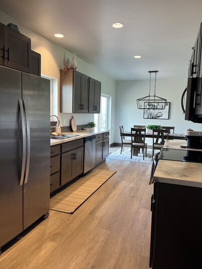 Brand new house with deck and amazing views on large country lot close to town.