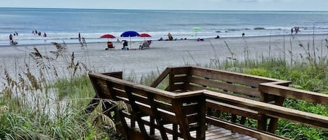 On the beach, sun loungers