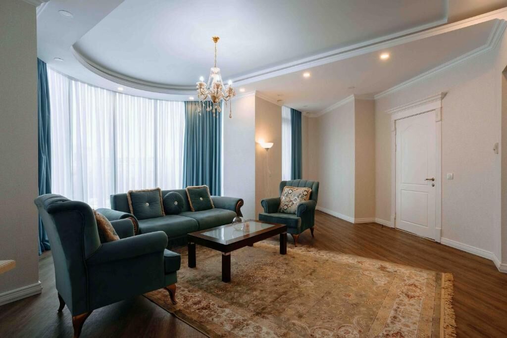 Suite, 1 King Bed, Non Smoking (VIP Suite) | Living area | 40-inch flat-screen TV with cable channels, TV, heated floors