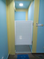 Blue Room | Bathroom | Shower, rainfall showerhead, eco-friendly toiletries, hair dryer