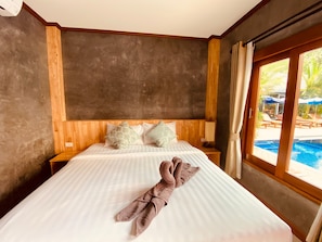 Deluxe Double Room, Pool View | Premium bedding, in-room safe, individually decorated