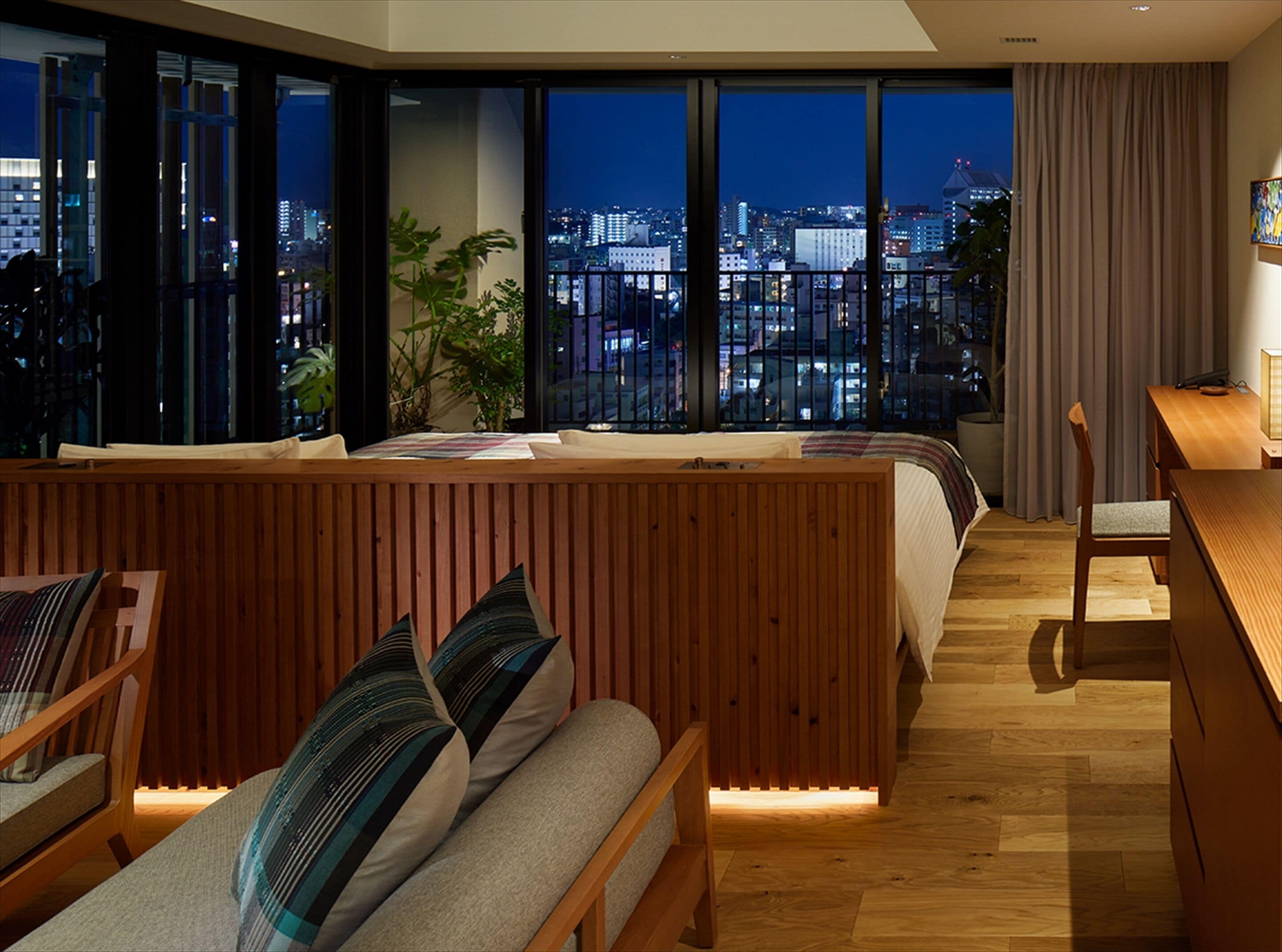 deluxe corner twin (with 1 sofa bed) | living area | 40-inch tv with digital channels