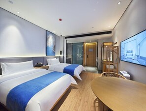 Desk, blackout curtains, free WiFi, bed sheets - Qianna Baihe Boutique Hotel (Zhengzhou)