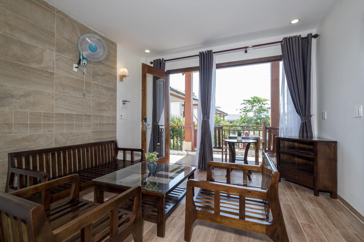 family suite | living room | 32-inch led tv with cable channels, tv