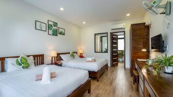 Twin Room, Garden View | Memory foam beds, minibar, individually decorated, desk