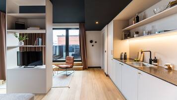 Design Studio, Patio (M) | Living area | TV
